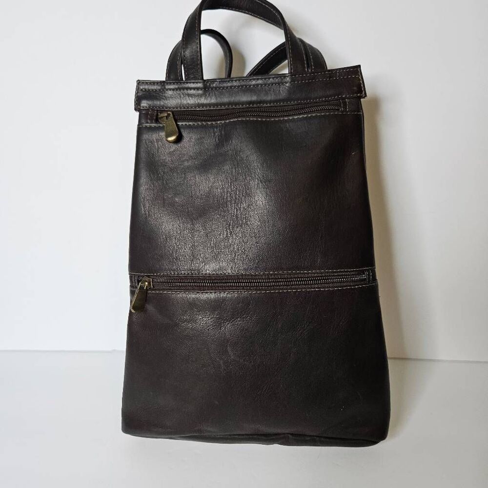 Le Donne brown leather backpack purse.